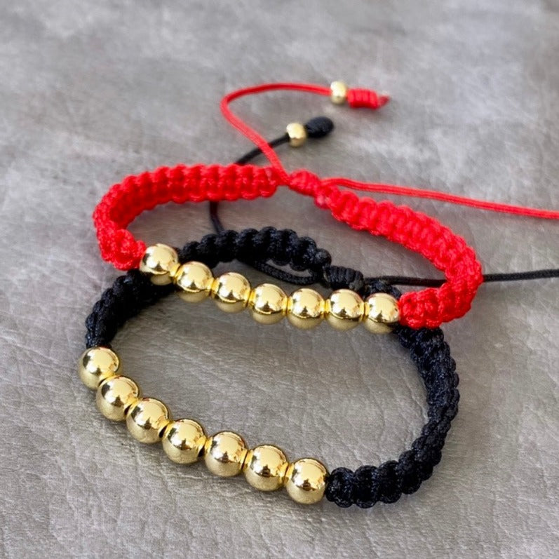 Pulseras pareja tejida golden hilo negro- rojo