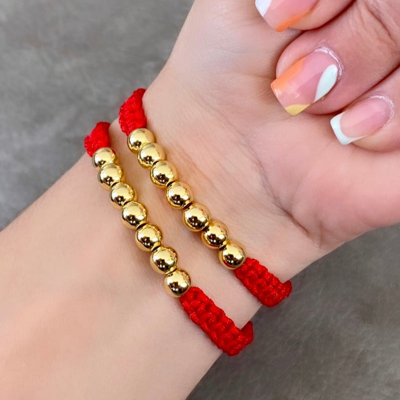 Pulseras pareja tejida golden hilo rojo